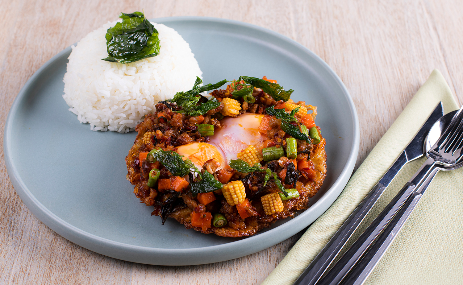 Stirfried Holy Basil with Crispy Fried Eggs (กะเพราหมูทรงเครื่องไข่ระเบิด)