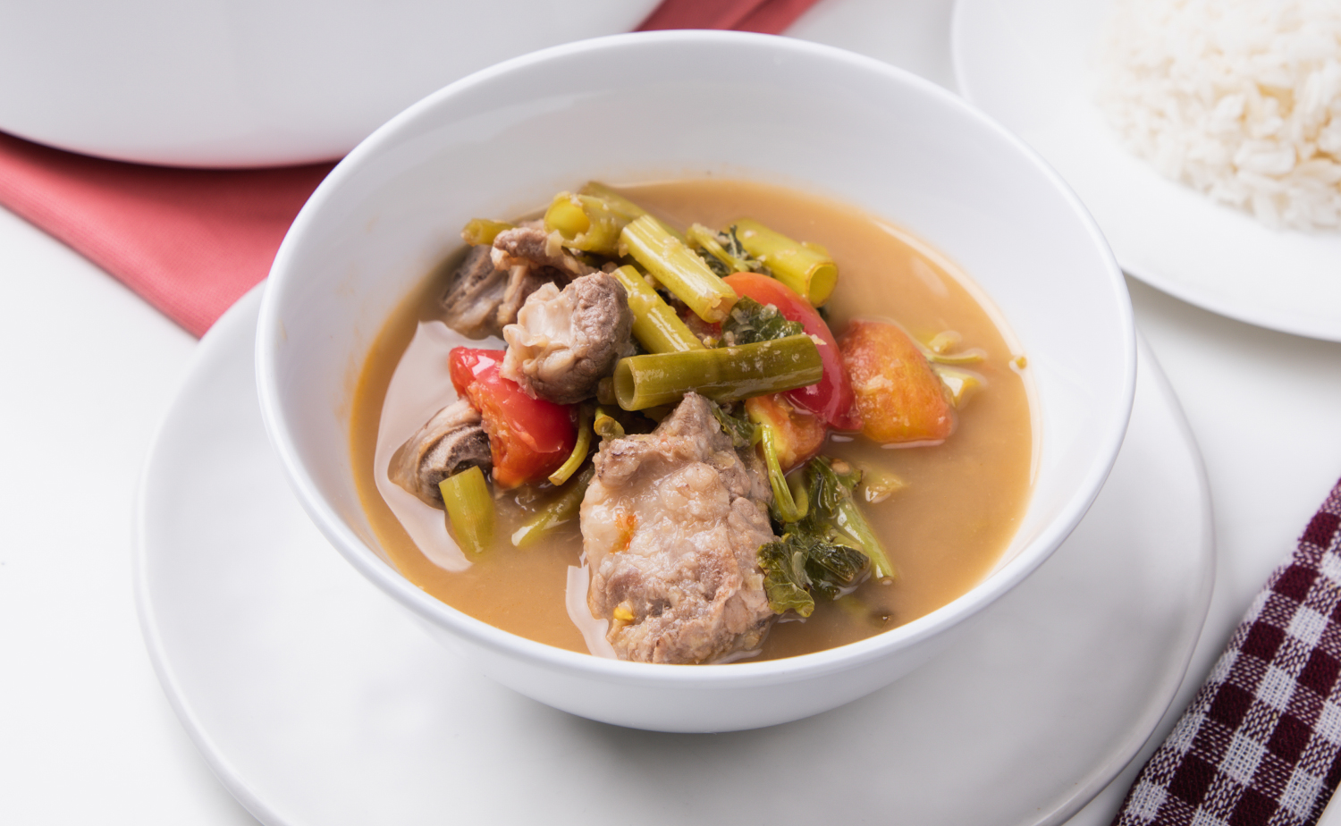 Pork ribs sour soup with water spinach (แกงผักบุ้งกระดูกหมูอ่อน)