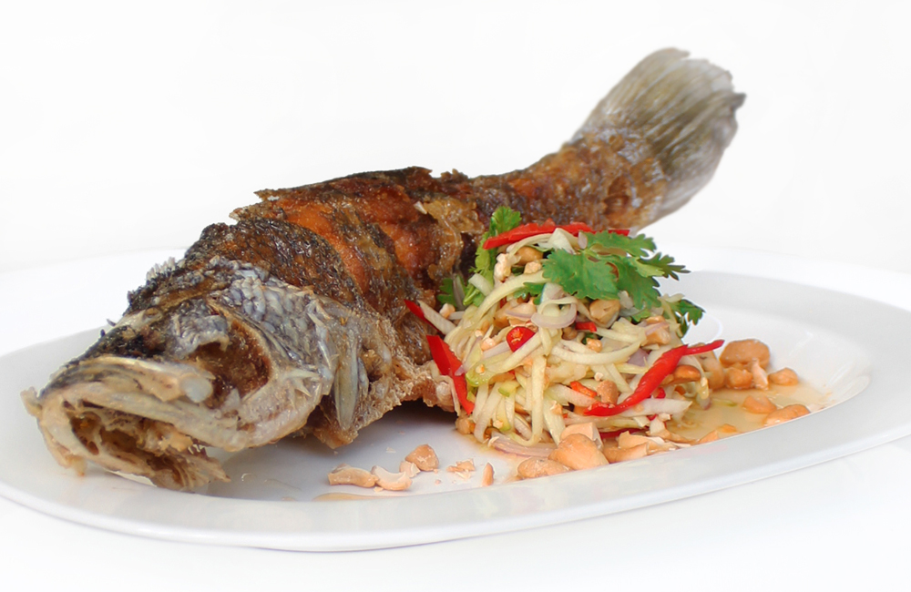 Deep Fried Whole Sea Bass with Seasoning Fish Sauce and Green Mango